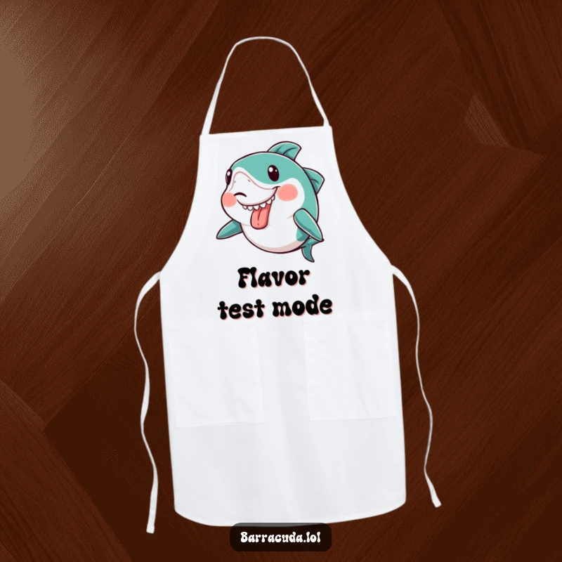 Funny kawaii barracuda making a silly face with its tongue sticking out slightly on a kitchen apron, adding humor to cooking.