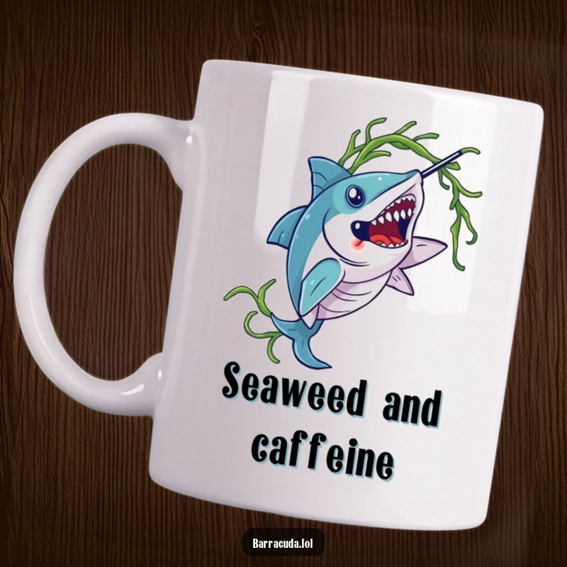 Funny barracuda mug, depicting a barracuda gracefully twirling a strand of seaweed with an air of whimsical elegance.