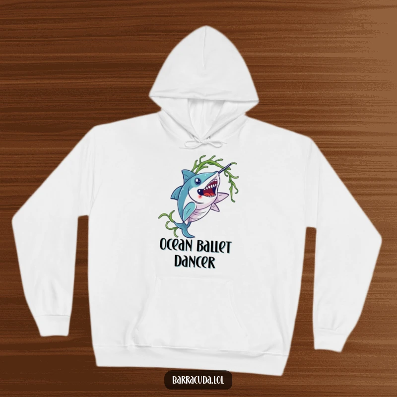 Funny barracuda hoodie, illustrating a barracuda elegantly twirling a strand of seaweed with majestic underwater grace.