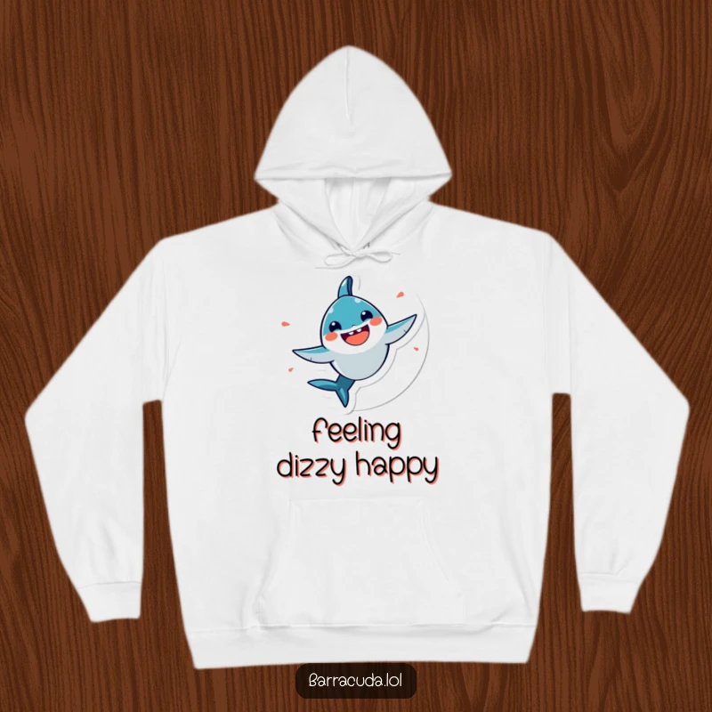 Funny, very happy kawaii barracuda spinning in a circle on a cozy hoodie, radiating warmth and pure delight.