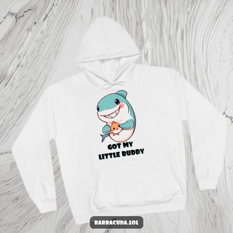 Funny hoodie featuring a grinning barracuda gently holding a shy, tiny fish, showcasing a heartwarming friendship.