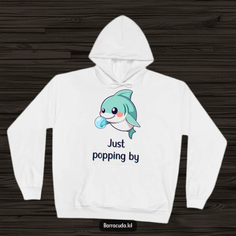 Funny kawaii barracuda nudging a bubble with its nose, soft and humorous hoodie.