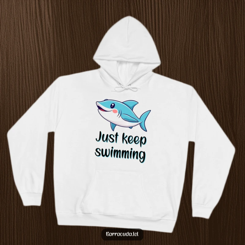 Funny barracuda hoodie showing a cute, smiling fish in a loop, offering warmth and a humorous, playful aquatic scene.