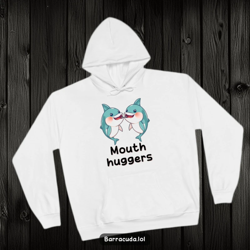 Funny pair of kawaii barracudas playfully bumping mouths on a cozy hoodie, radiating warmth and playful connection.