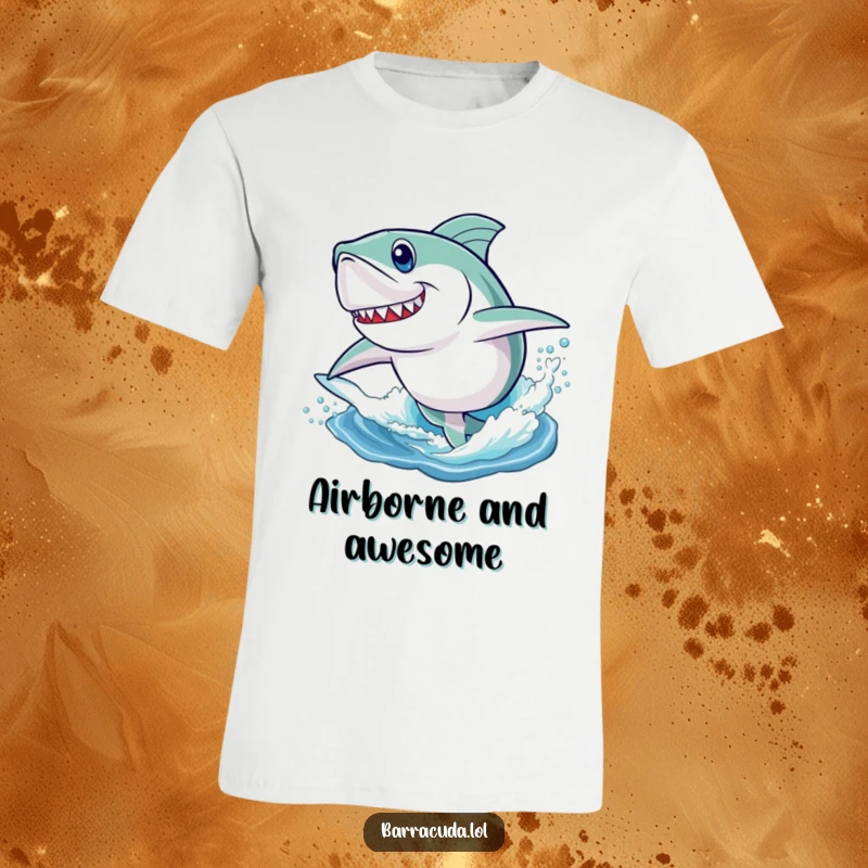 Funny t-shirt featuring a determined barracuda mid-leap, joyfully jumping out of the water, conveying pure aquatic excitement.