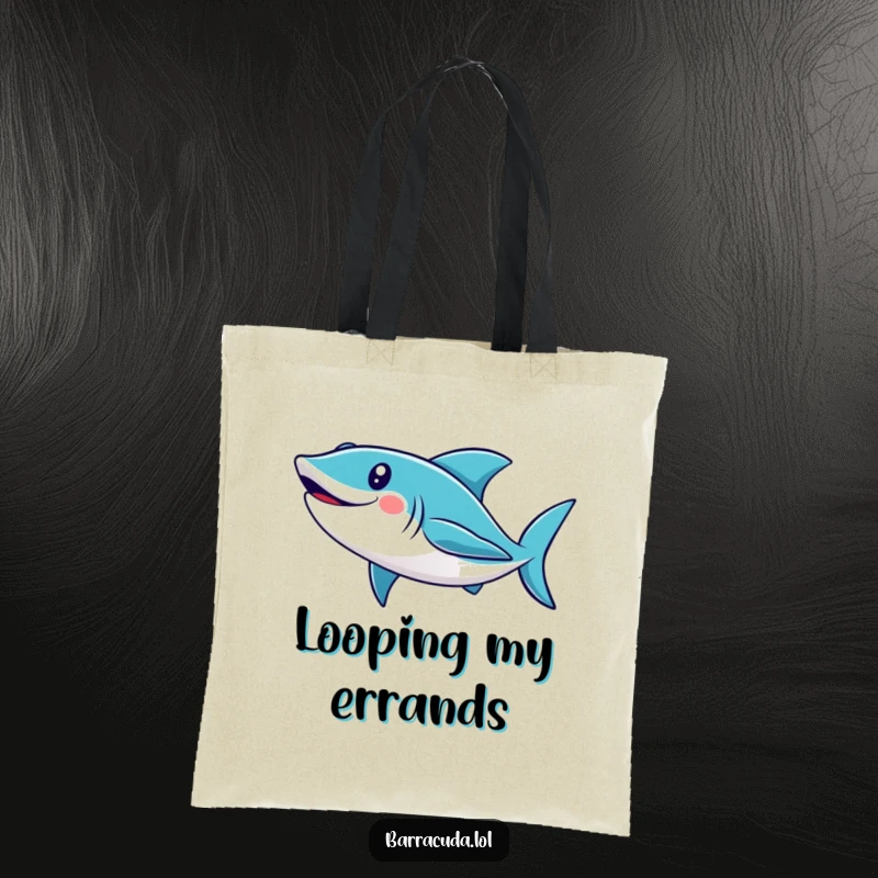Funny barracuda tote bag with a cute, smiling fish swimming in a loop, ideal for carrying goods with a touch of aquatic humor.